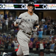 New York Yankees’ Aaron Judge gestures as he runs the bases after hitting a solo home run, his 62nd of the season, during the first inning in the second baseball game of a doubleheader against the Texas Rangers in Arlington, Texas, Tuesday, Oct. 4, 2022.